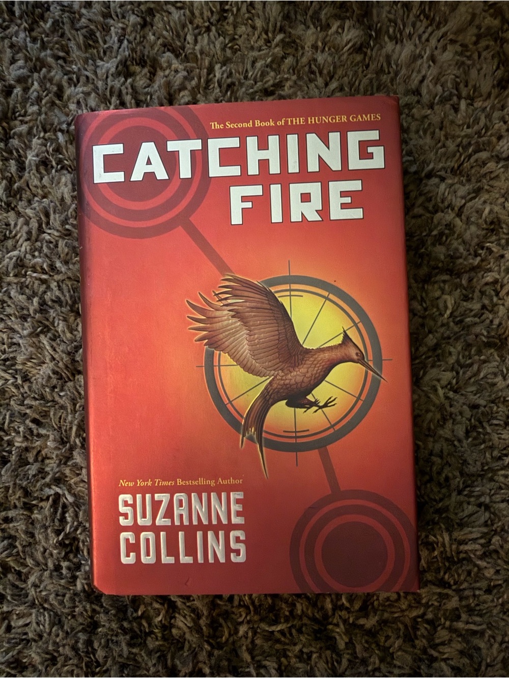 Scholastic Catching Fire Hardcover - Red and Yellow Cover